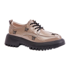 Damenschuhe mit dunkelbeigen Verzierungen