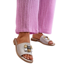 S. BARSKI Flache Damensandalen mit Verzierungen beige