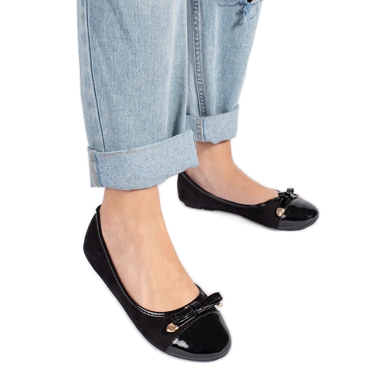 Schwarze flache Ballerinas