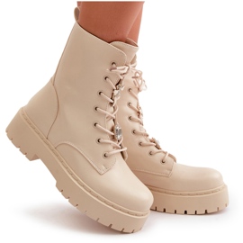 Isolierte Frauenstiefel mit beige Stiften