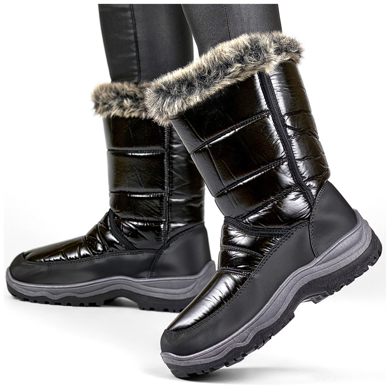 Hohe, isolierte schwarze Damen-Schneestiefel mit schwarzem Fell