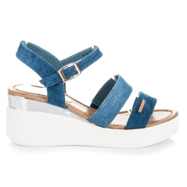 Vices Sandalen auf einem Denim-Keil blau