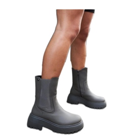 Grüne isolierte Plateaustiefel