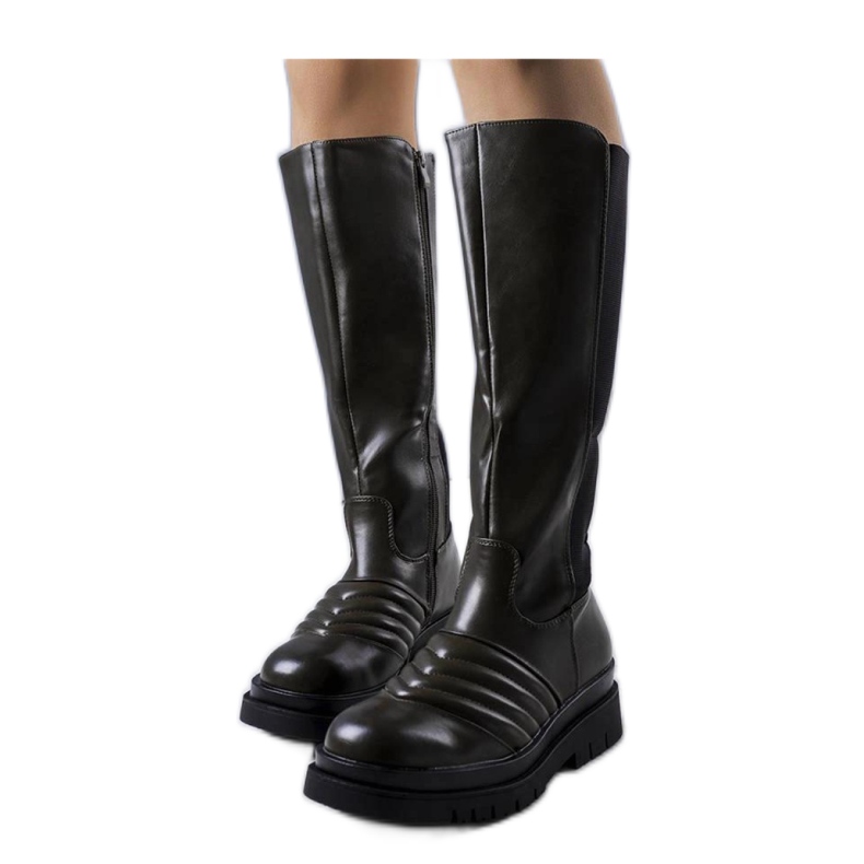 Grüne Stiefel mit Steppung