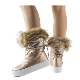 Metallische Schneestiefel mit dekorativem Fell rosa