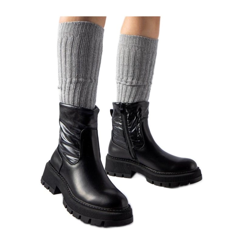 Schwarze Stiefeletten mit dekorativem Obermaterial