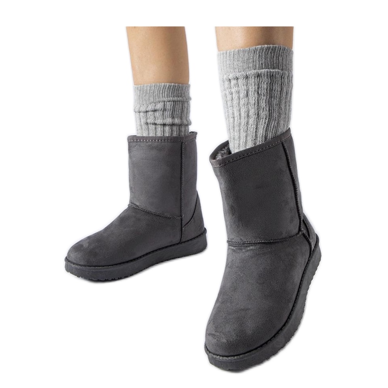 Graue isolierte klassische Schneestiefel