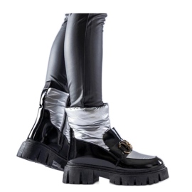 Schwarze und silberne Lack-Schneestiefel