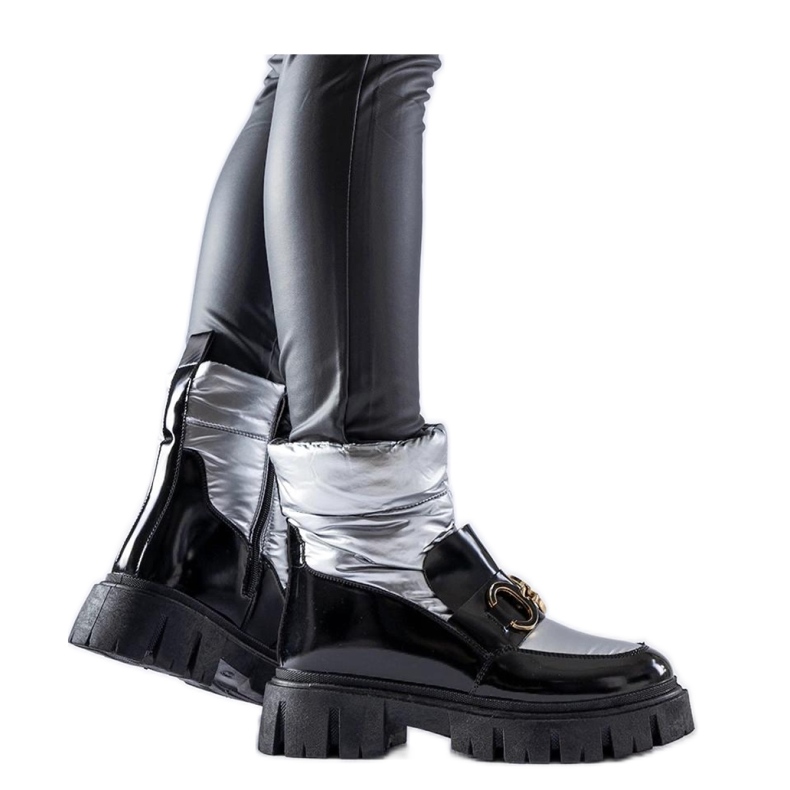 Schwarze und silberne Lack-Schneestiefel