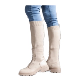 Beigefarbene Slip-On-Stiefel mit flexiblem Obermaterial aus Stoff