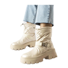 Beige lackierte Schneestiefel