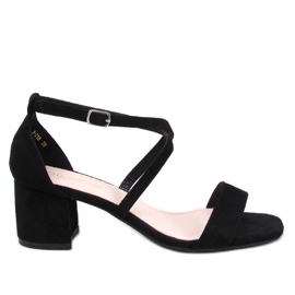 Schwarze Sandalen mit niedrigem Absatz