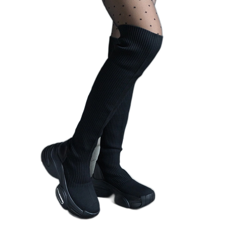 Schwarze Slip-On-Stiefel mit flexiblem Obermaterial und massiver Sohle
