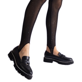 Schwarze Slipper mit Öko -Leder mit einer Verzierung