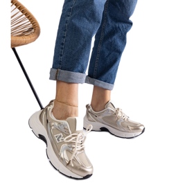 Goldene klassische Sport-Sneaker