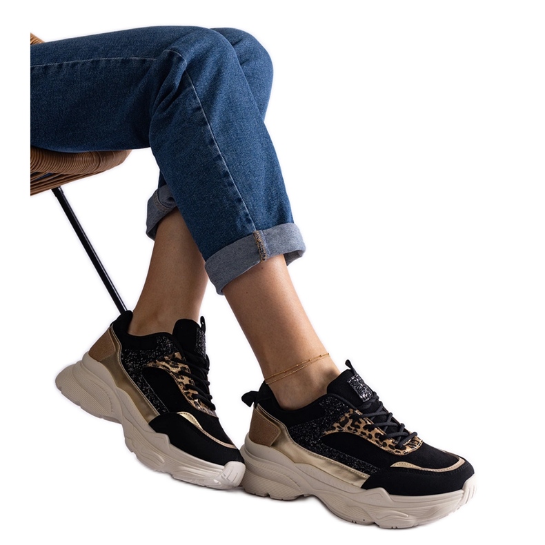 Schwarze Sneaker mit Glitzereinsätzen