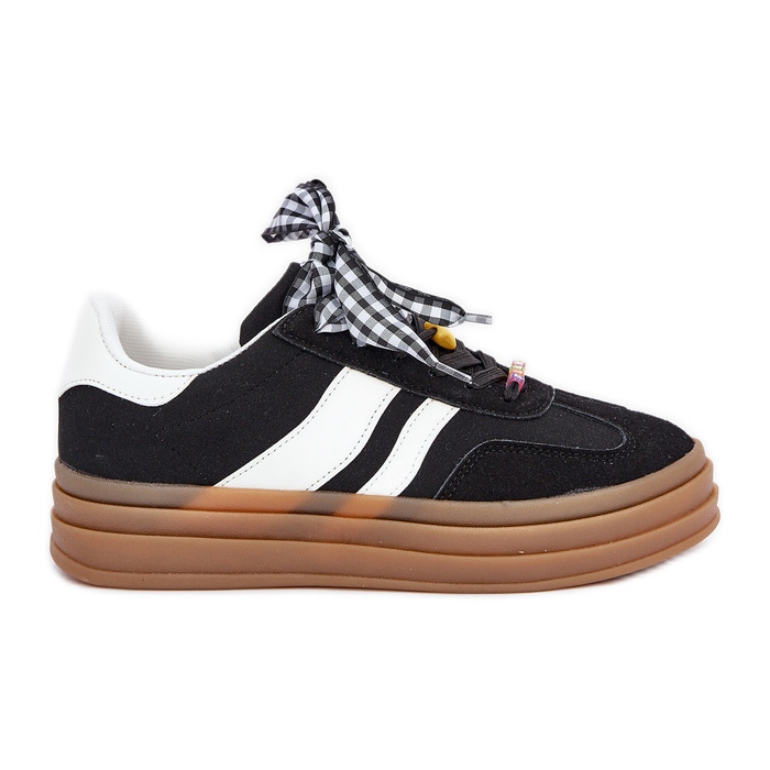 Frauen -Turnschuhe mit schwarzen Stiften