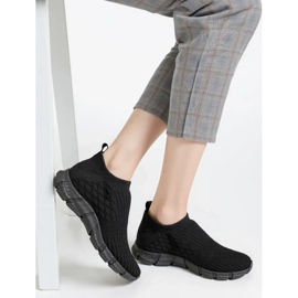 Schwarze Stiefel der Frauen