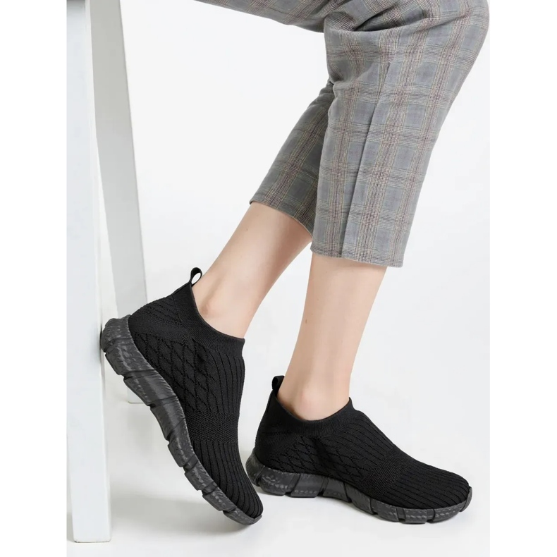 Schwarze Stiefel der Frauen