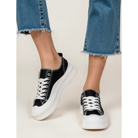 Frauen -Turnschuhe schwarz