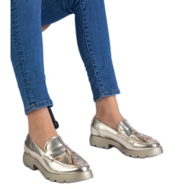 Goldene metallische klassische Schuhe mit Fransen