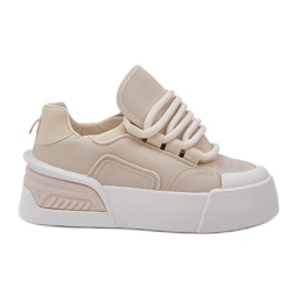 Frauen -Turnschuhe mit dicken Schnürsenkel auf der Plattform Beige