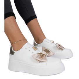Weiß- und Gold -Turnschuhe für Frauen mit einem Bogen