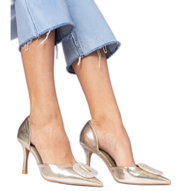 Metallische goldene High Heels mit Zirkonen dekoriert