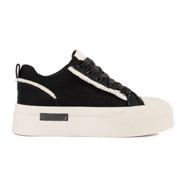 Schwarz-weiße Plateau-Sneaker