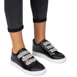 Schwarze Turnschuhe mit Tierklettverschluss