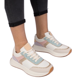 Mehrfarbige Frauen -Turnschuhe mit Glitzer mit einem Tiermuster beige