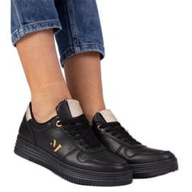 Schwarze Frauen -Turnschuhe mit goldenem Glitzer