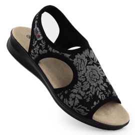 Frauensandalen auf einem Ausschlag flexibel mit Blumen schwarz unisoft 7196