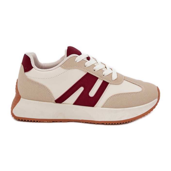 Frauensportschuhe auf beige-blaue Plattform