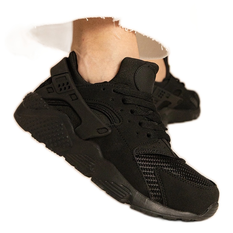 Schwarze Turnschuhe Sportsneaker