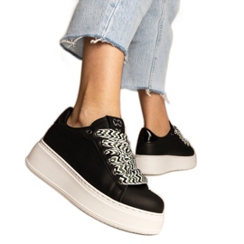 Schwarze Frauen -Turnschuhe mit massiver Schnürung =