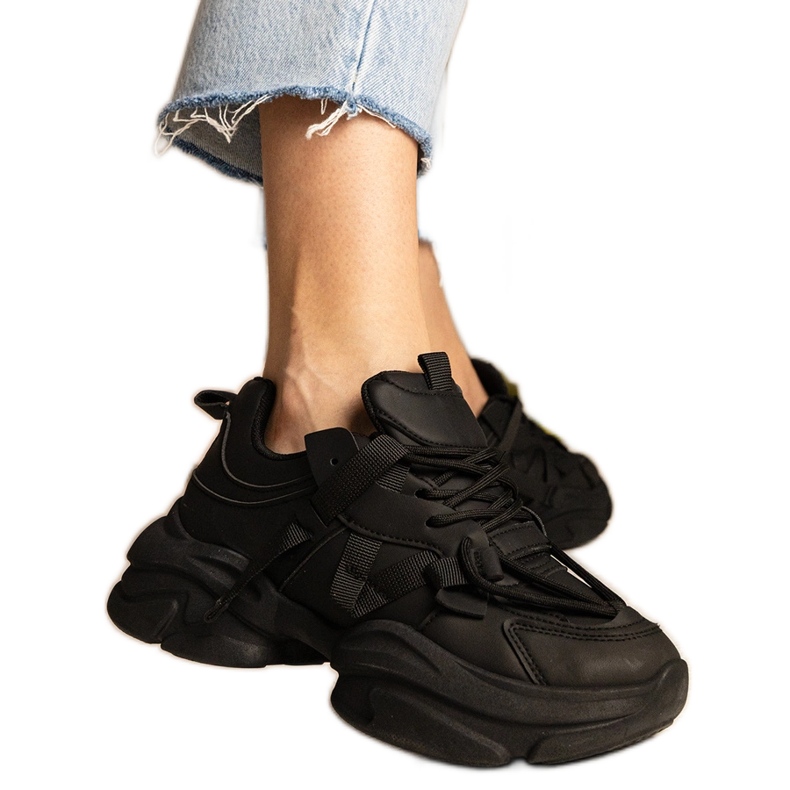 Schwarze Turnschuhe Frauen massive Sportarten