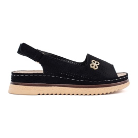 Goodin Openwork weiche schwarze Sandalen mit einer Verzierung