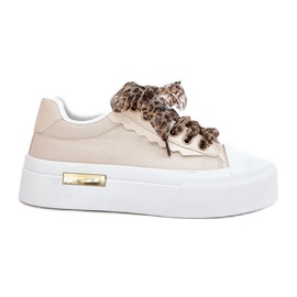 Frauen -Sneaker auf einer massiven Plattform mit dekorativem Schnürsenkel Beige