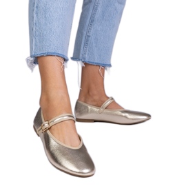 Goldene Frauen -Ballerinas mit einer Schnalle