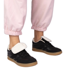 Schwarze Turnschuhe Frauensport -Sneaker