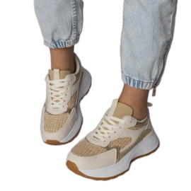 Beige Sportsneaker mit einem geflochtenen Einsatz