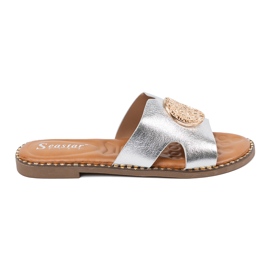 Seastar Silberflip flops mit einer goldenen Dekoration