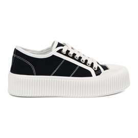 Shelvt Schwarze Turnschuhe, die auf eine dicke Sohle geschnürt sind