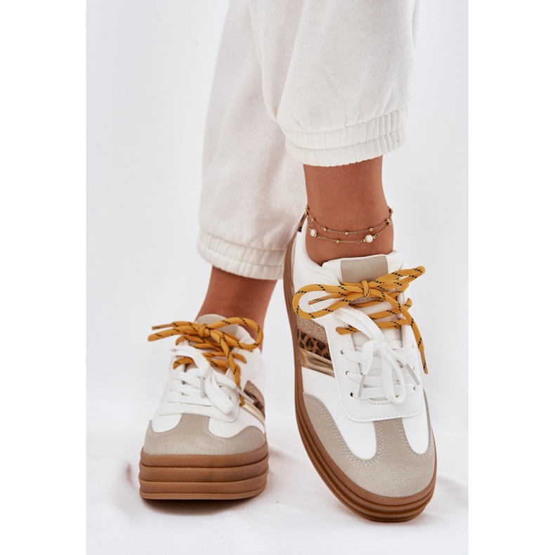 Frauen -Sneaker auf der Plattform mit Double Schnürung weißer Leopardendruck
