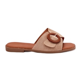 Flat -theeled -Flip -Flops für Frauen mit einer beige Klemme