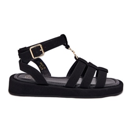 Frauensandalen auf der Plattform mit einem goldenen Detail schwarz