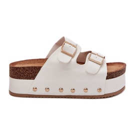 Damenflip flops mit Schnallen auf einer massiven Plattform weiß