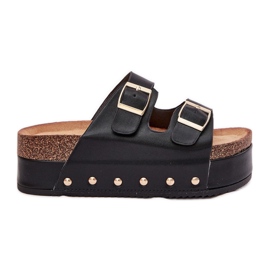 Frauenflip flops mit Schnallen auf einer massiven Plattform schwarz