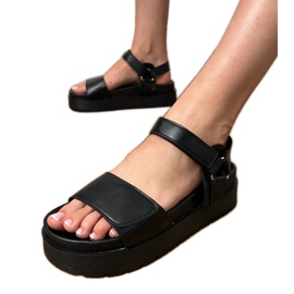 Schwarze Öko -Leder -Sandalen auf der Plattform